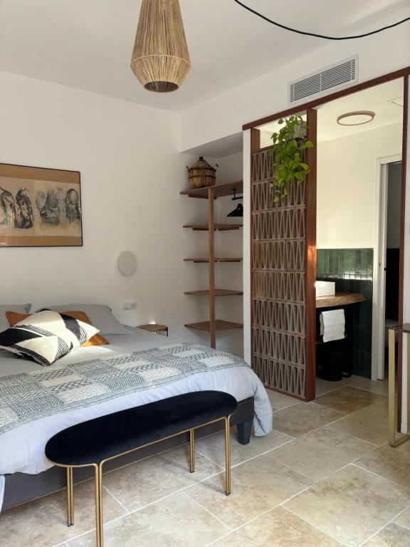 Postel nebo postele na pokoji v ubytování Maison Lumio