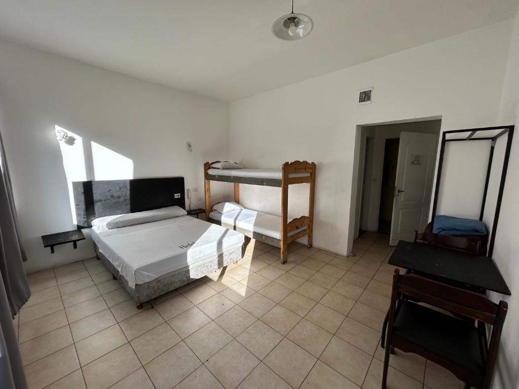 Postel nebo postele na pokoji v ubytování Hotel Lua