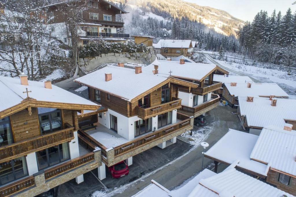 an aerial view of a house in the snow at Nationalpark Chalet Jagdhausspitze in Neukirchen am Großvenediger