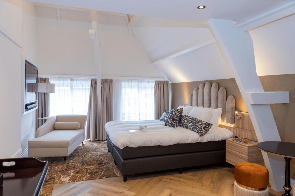 Postel nebo postele na pokoji v ubytování Boutique Hotel Jersey
