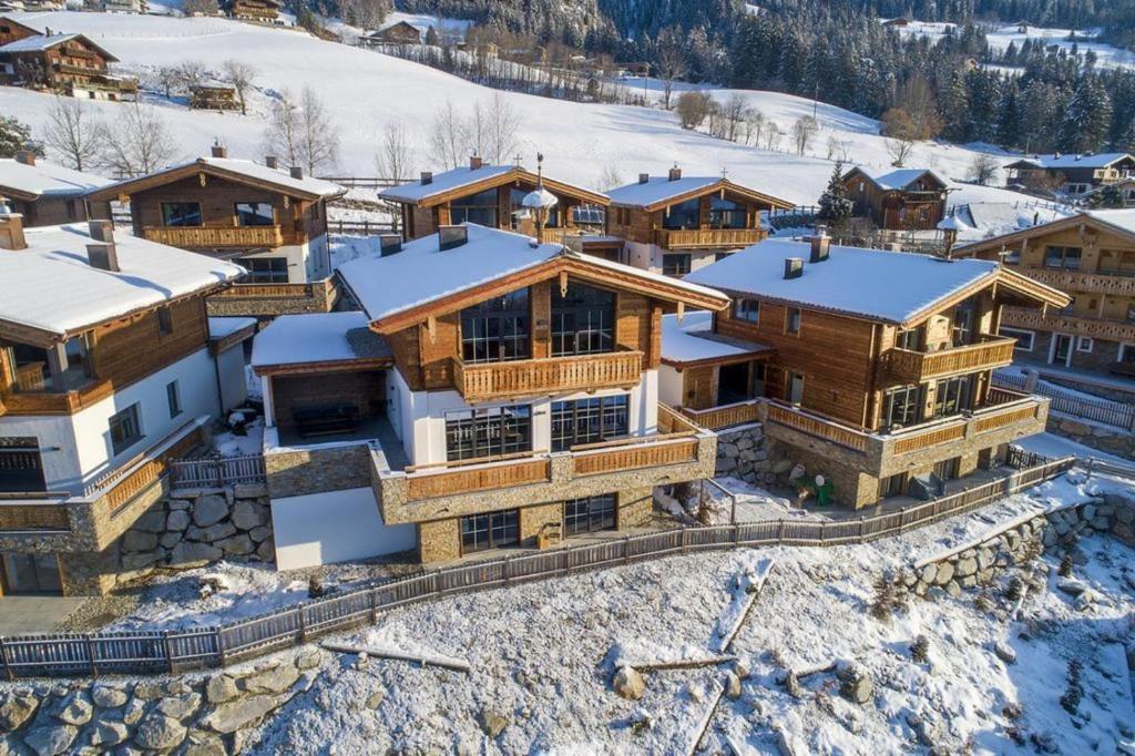 an aerial view of a house in the snow at Nationalpark Chalet Hohe Warte in Neukirchen am Großvenediger