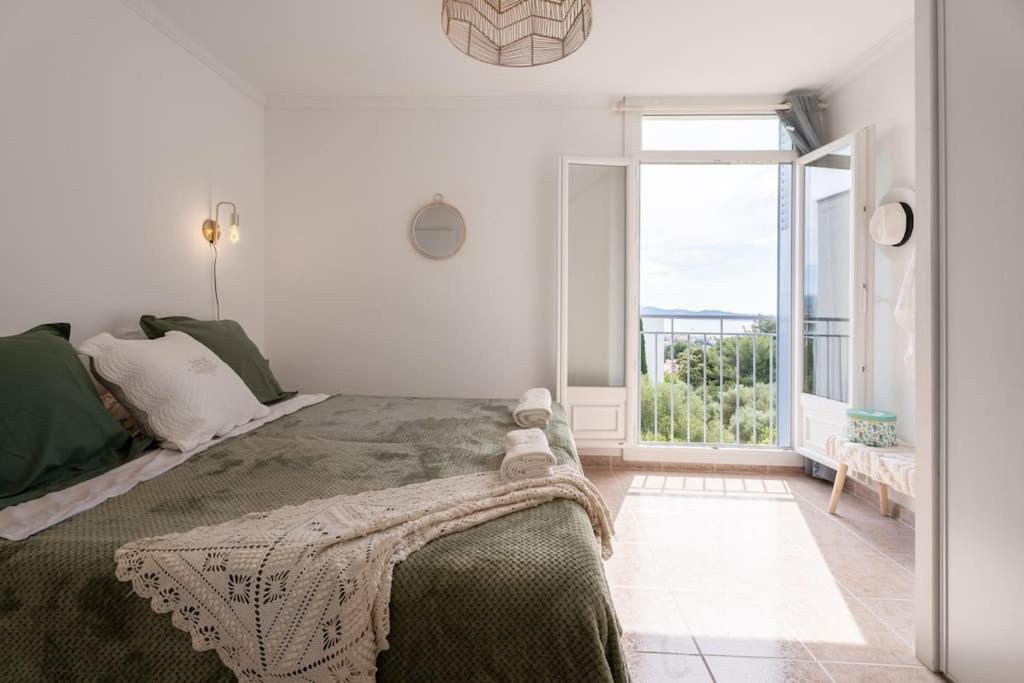 Postelja oz. postelje v sobi nastanitve Loft des Crêtes vue mer