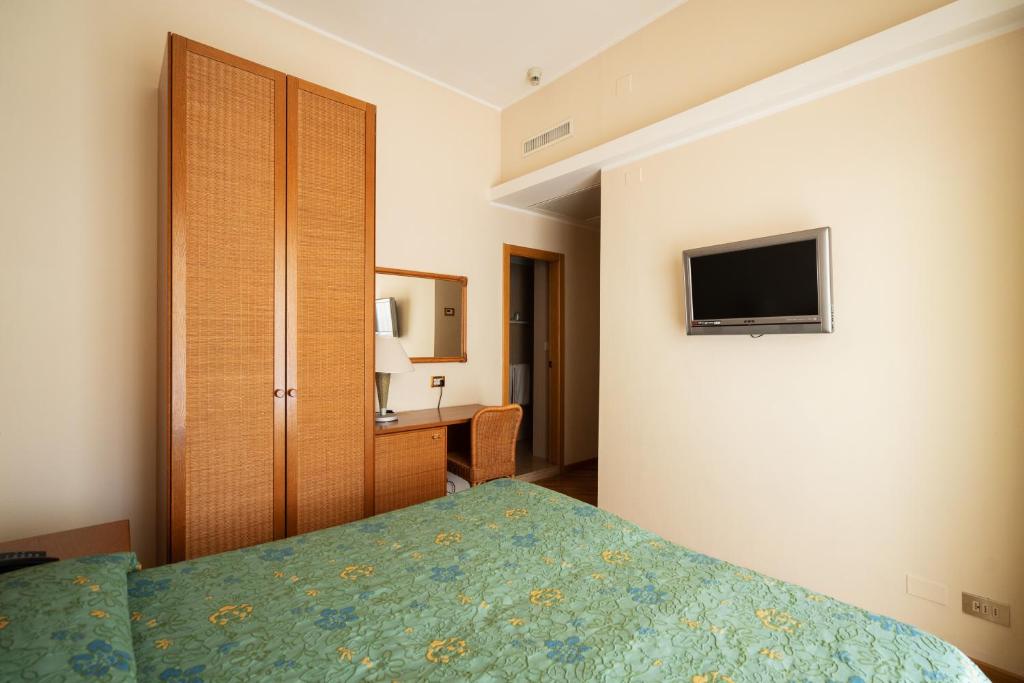 TV a/nebo společenská místnost v ubytování Hotel Scogliera