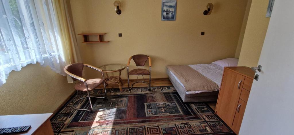Postel nebo postele na pokoji v ubytování Dom Wczasowy Orka