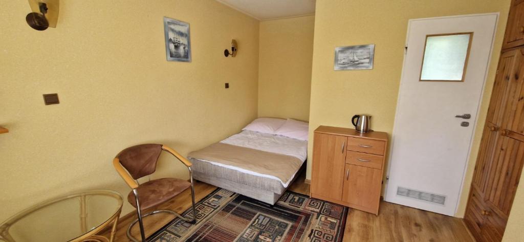 Postel nebo postele na pokoji v ubytování Dom Wczasowy Orka