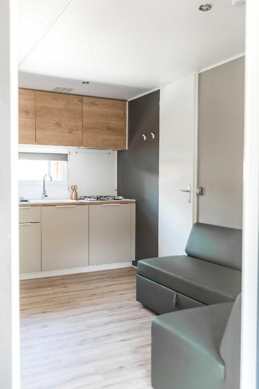 Kuchyň nebo kuchyňský kout v ubytování Nova Lodges