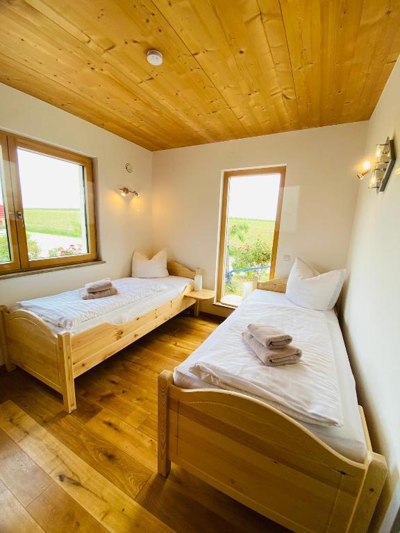 Postel nebo postele na pokoji v ubytování Weinbergshof Rickel
