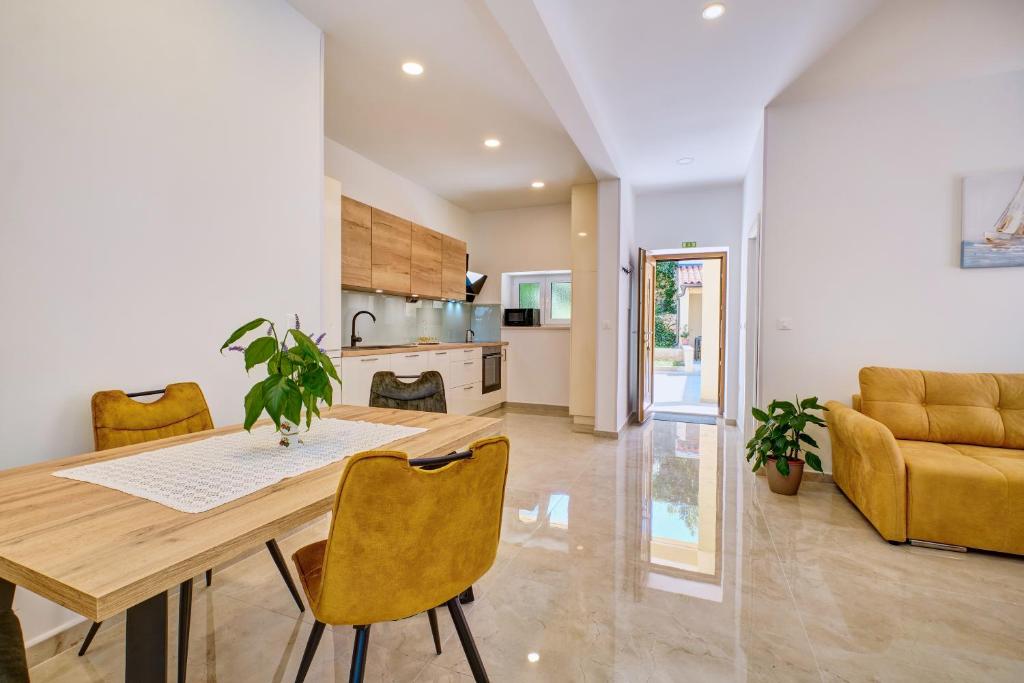 Kuchyň nebo kuchyňský kout v ubytování Apartman REGINA