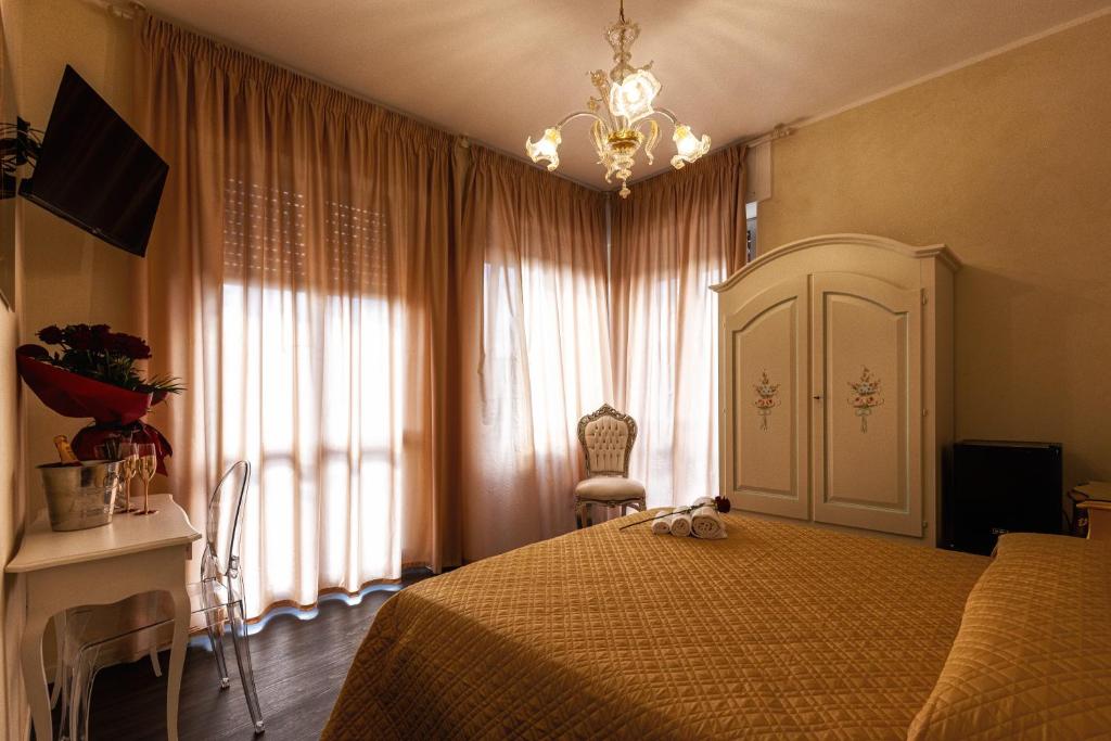Postel nebo postele na pokoji v ubytování Amy Rooms