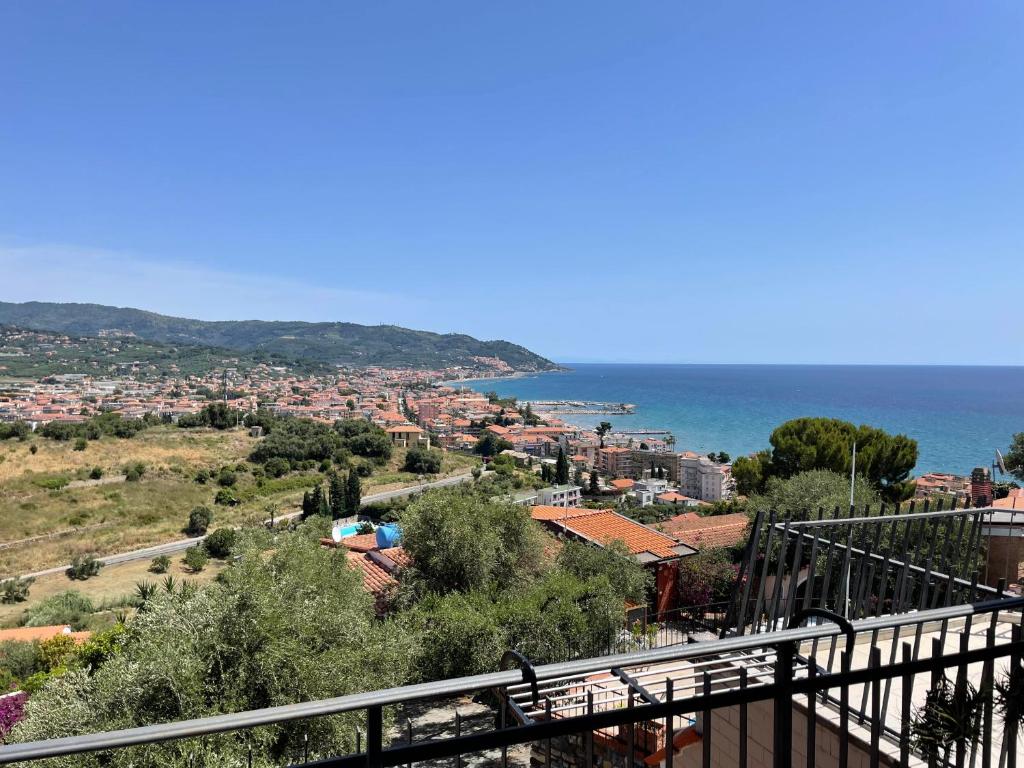a view of a city and the ocean at Casa Panorama in Diano Marina