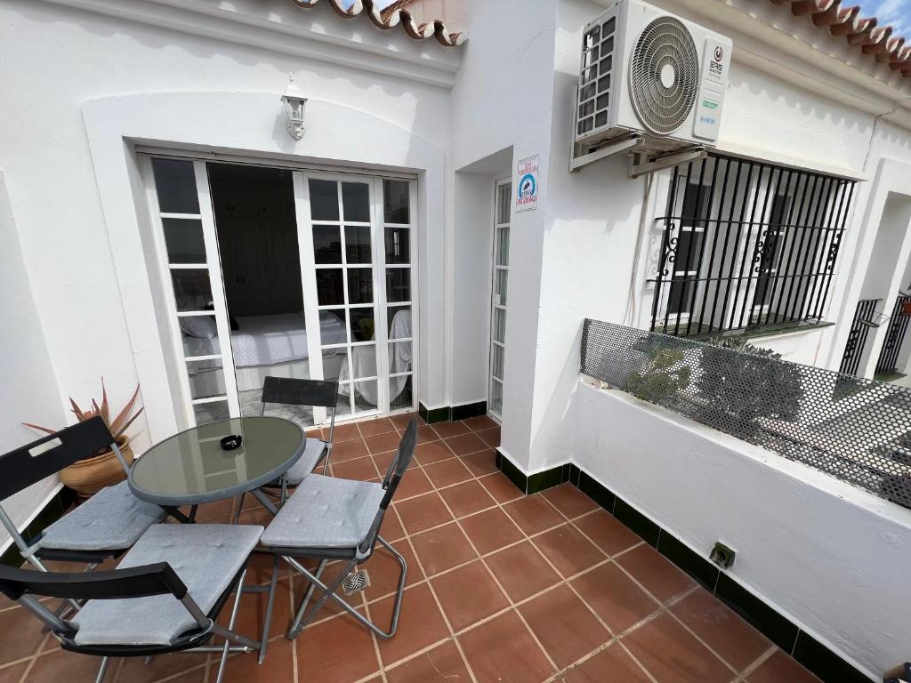 Kuchyň nebo kuchyňský kout v ubytování El Atico con Vistas al Mediterraneo parking y Piscina 6p