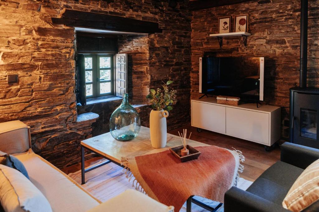 TV a/nebo společenská místnost v ubytování Casa do Corral