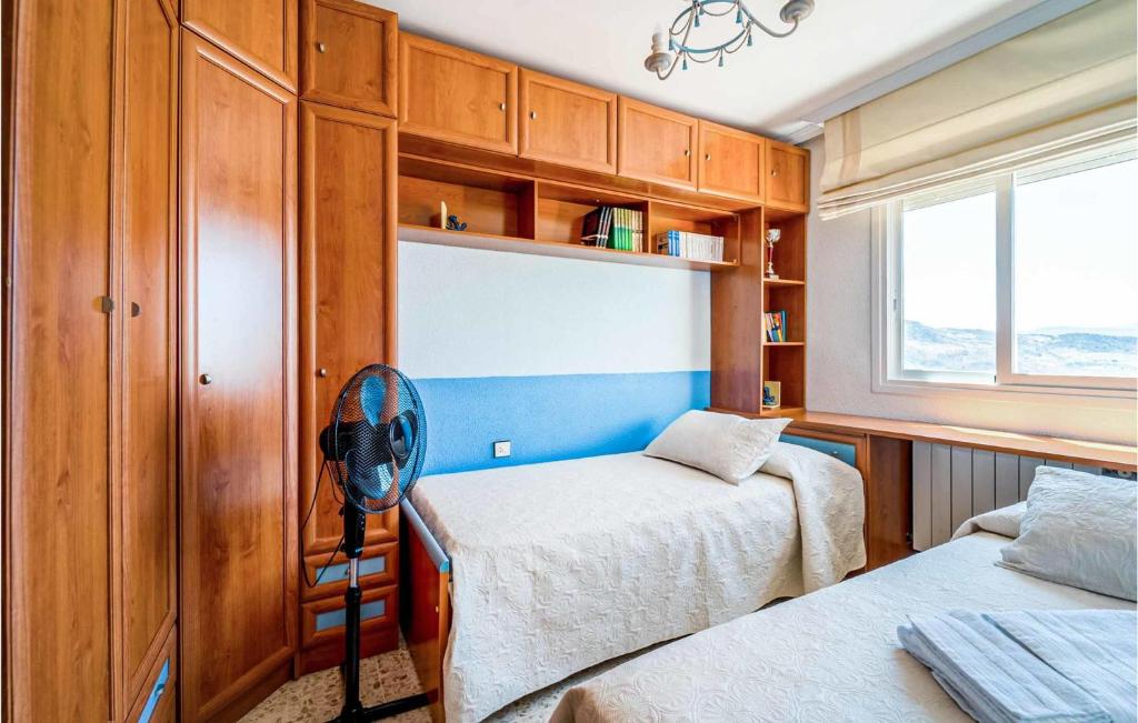 Posteľ alebo postele v izbe v ubytovaní 3 Bedroom Cozy Apartment In Pegalajar