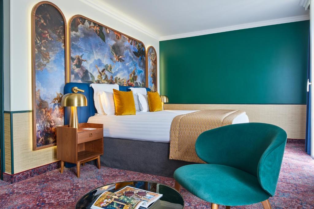 Coin salon dans l'établissement Hôtel Le Versailles