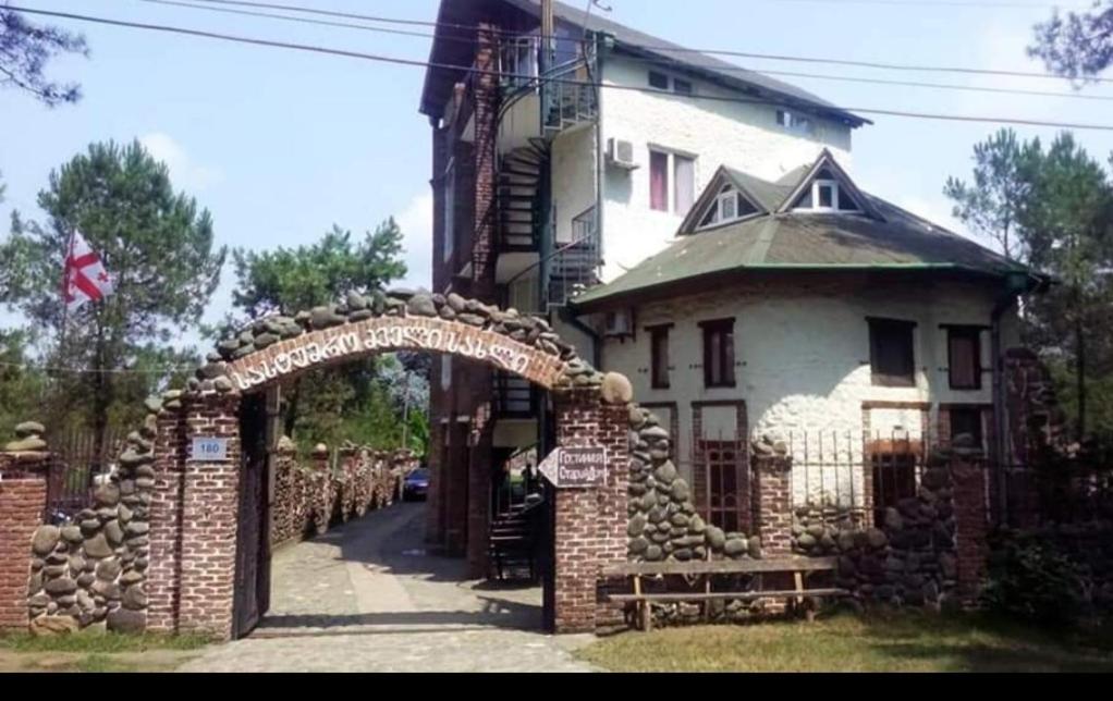 a brick building with an archway in front of it at old house ureki in Ureki
