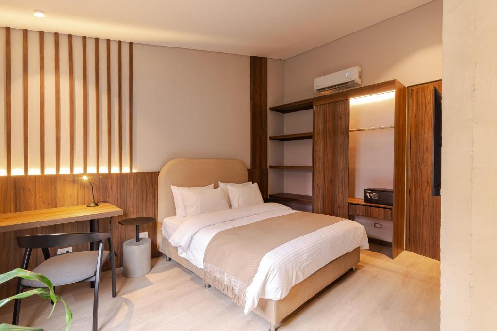 Postel nebo postele na pokoji v ubytování Hotel Lincoln
