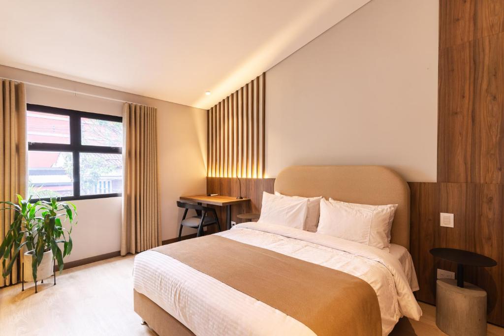 Postel nebo postele na pokoji v ubytování Hotel Lincoln