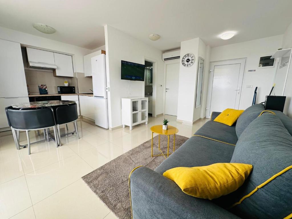 Televízia a/alebo spoločenská miestnosť v ubytovaní Luxury apartment CityZen
