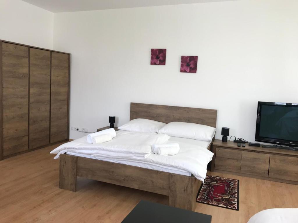 Postel nebo postele na pokoji v ubytování Apartmán VAJB