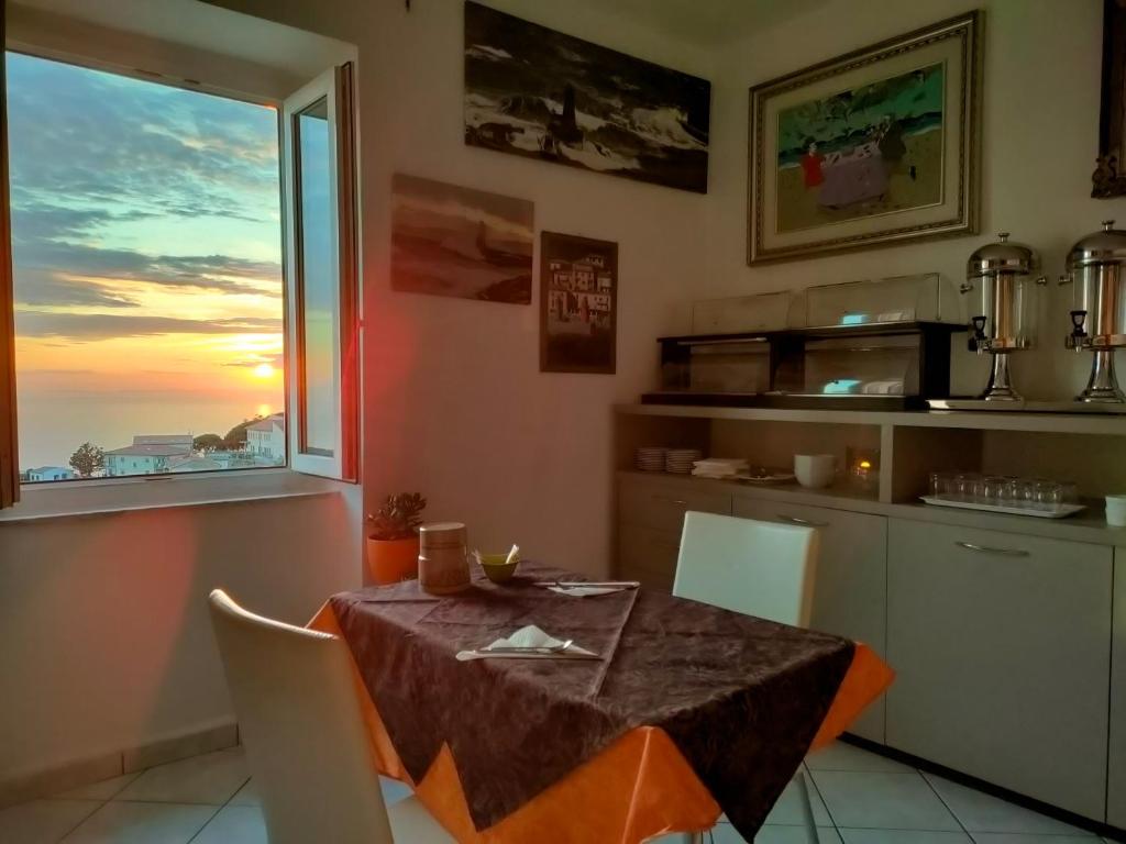 Kuchyň nebo kuchyňský kout v ubytování B&B Airone