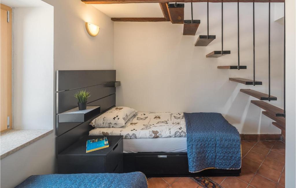 Posteľ alebo postele v izbe v ubytovaní Cozy Home In Vrsar With Kitchen