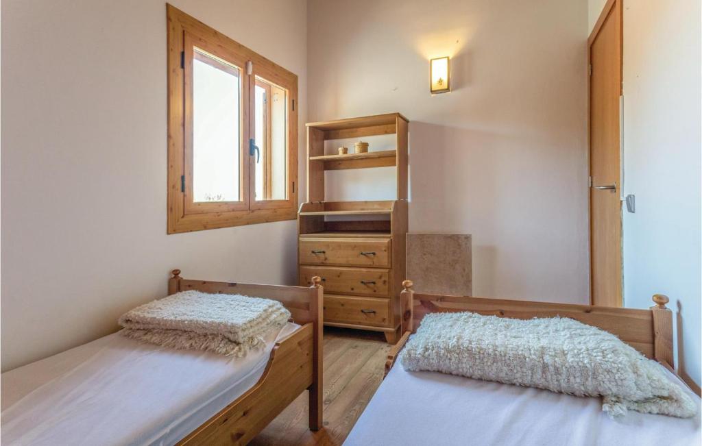 Postel nebo postele na pokoji v ubytování Cozy Home In Macanet De La Selva