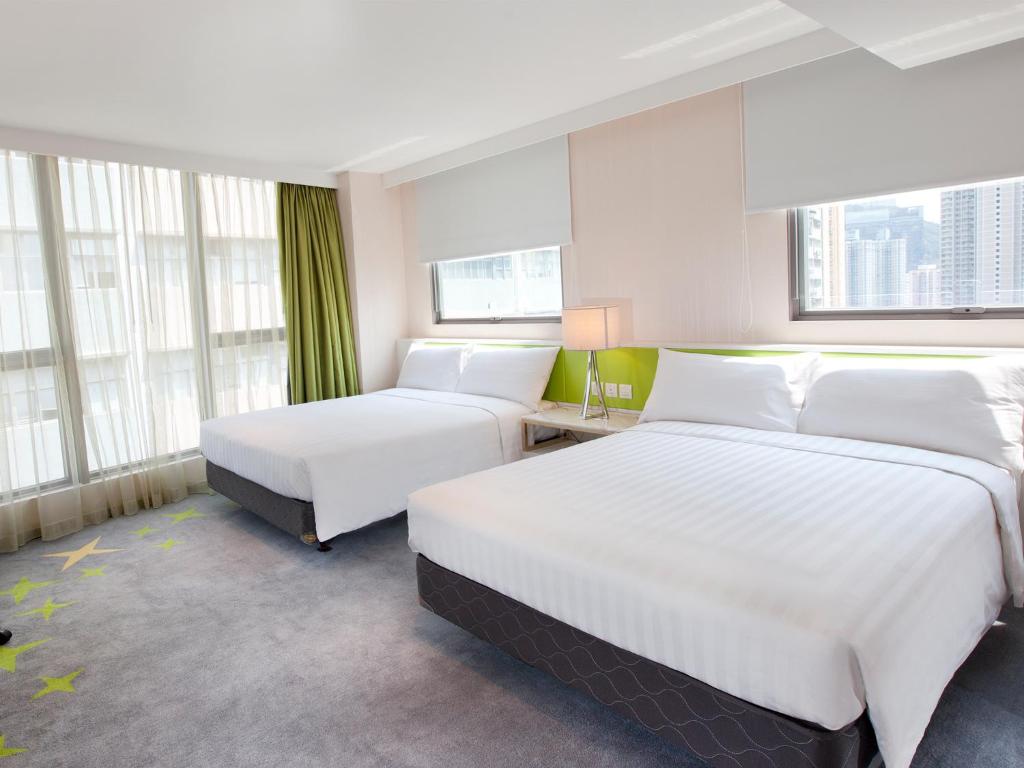 Voodi või voodid majutusasutuse Dorsett Tsuen Wan, Hong Kong toas