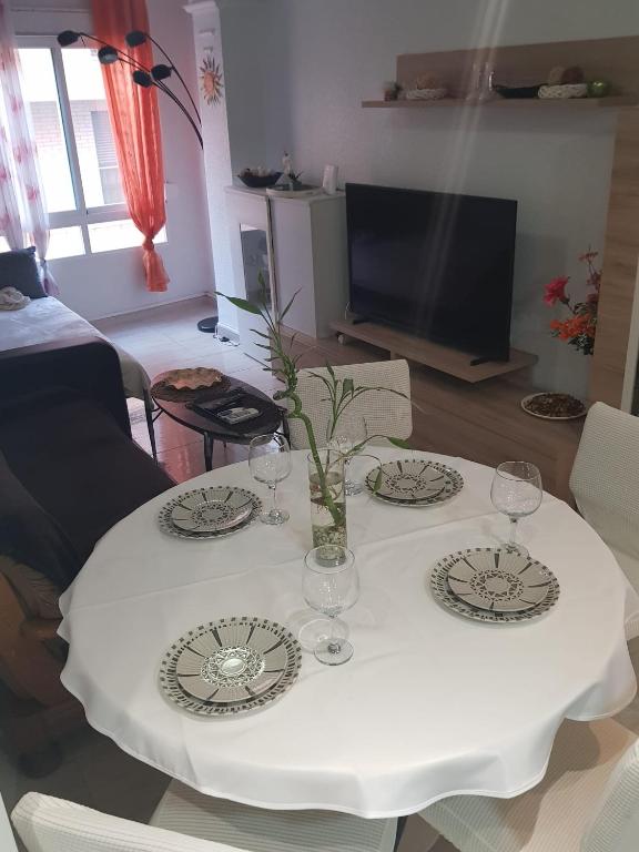 A television and/or entertainment centre at Apartalux Brizo Suites