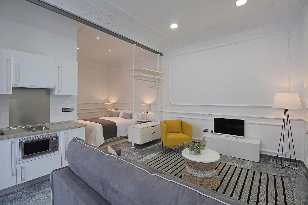Kuchyňa alebo kuchynka v ubytovaní Apartamentos Plaza Constitución - Larios