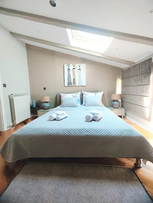 Łóżko lub łóżka w pokoju w obiekcie Luxury Apartment Regina