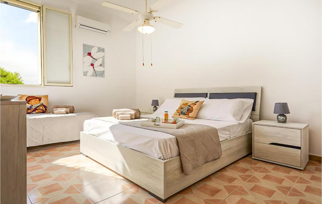 A bed or beds in a room at Villa Natalia