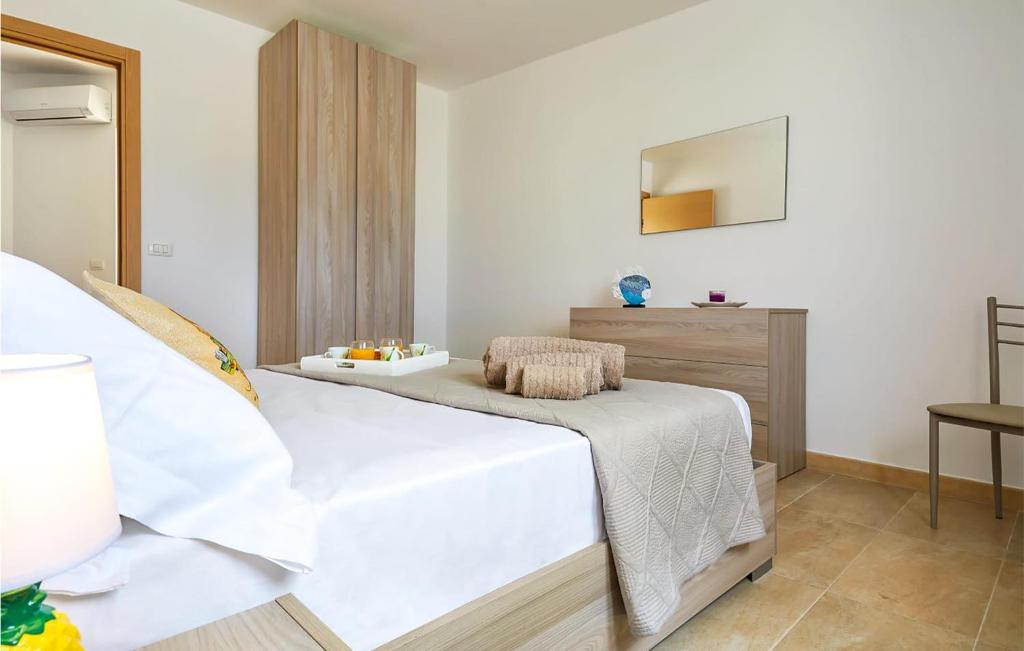 A bed or beds in a room at Villa Natalia