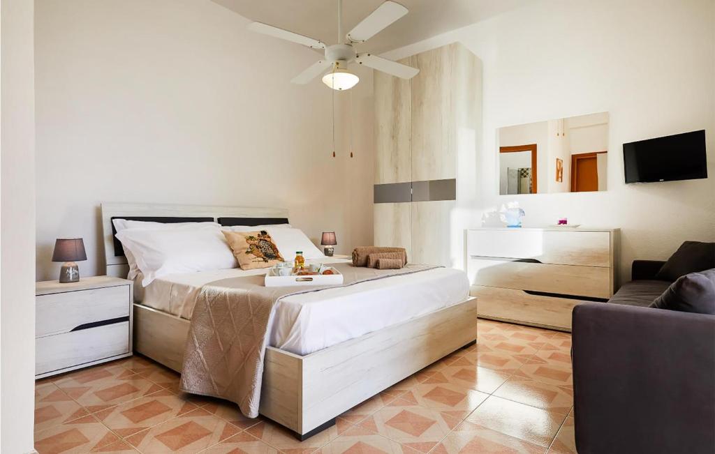 A bed or beds in a room at Villa Natalia