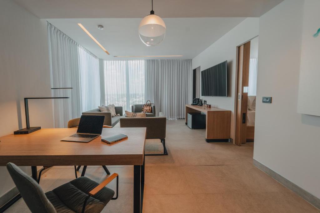TV a/nebo společenská místnost v ubytování AKEN MIND Mérida Hotel