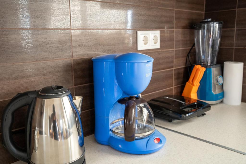 Příslušenství pro přípravu čaje a kávy v ubytování Serenity house