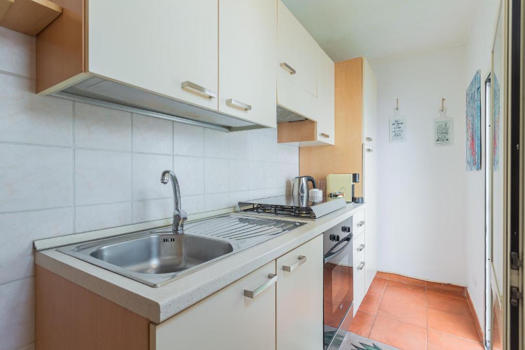 Kuchyň nebo kuchyňský kout v ubytování RoVí Garden House