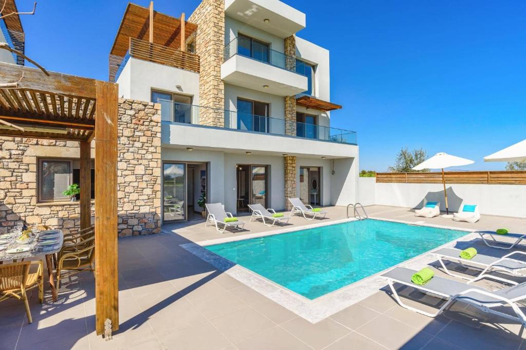 Bazén v ubytování Villa Eva Olivestone by Villa Plus nebo v jeho okolí