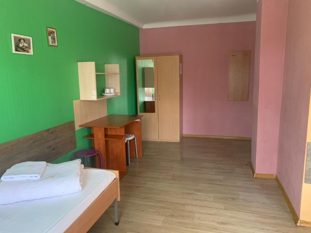 Postel nebo postele na pokoji v ubytování Podolski Hostel