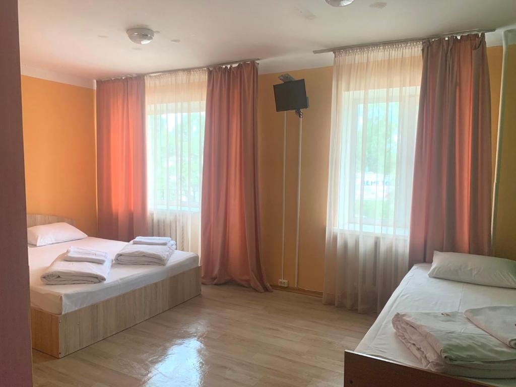 Postel nebo postele na pokoji v ubytování Podolski Hostel