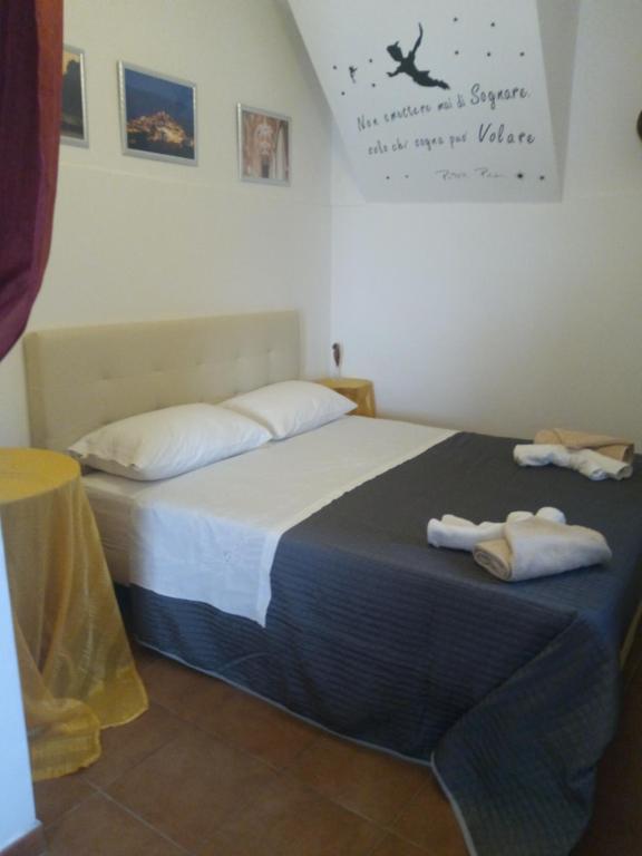 Postel nebo postele na pokoji v ubytování Bnb Peter Pan