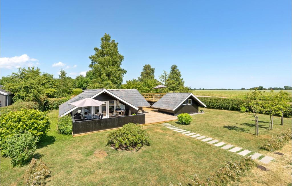 an aerial view of a house in a field at Holiday Home Birkely Nysted Iv in Nysted