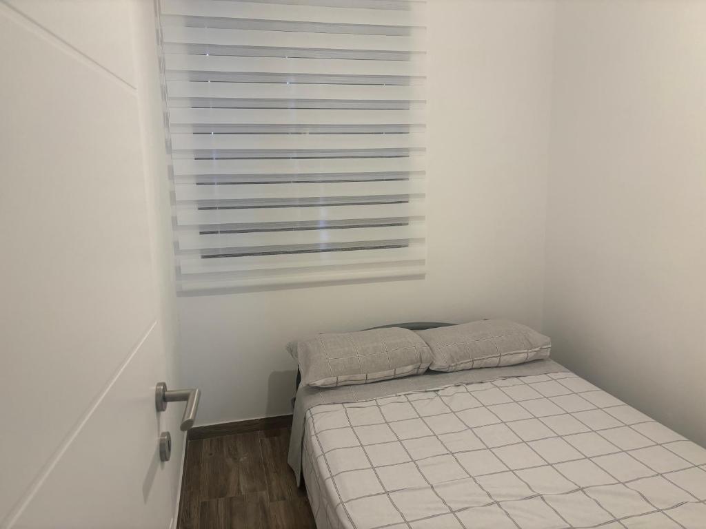 Posteľ alebo postele v izbe v ubytovaní Daniela