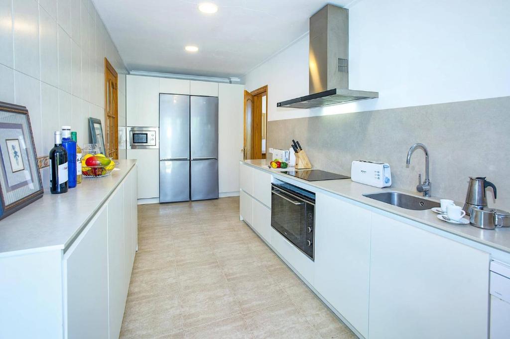 Kuchyň nebo kuchyňský kout v ubytování Villa Illa Petita by Villa Plus