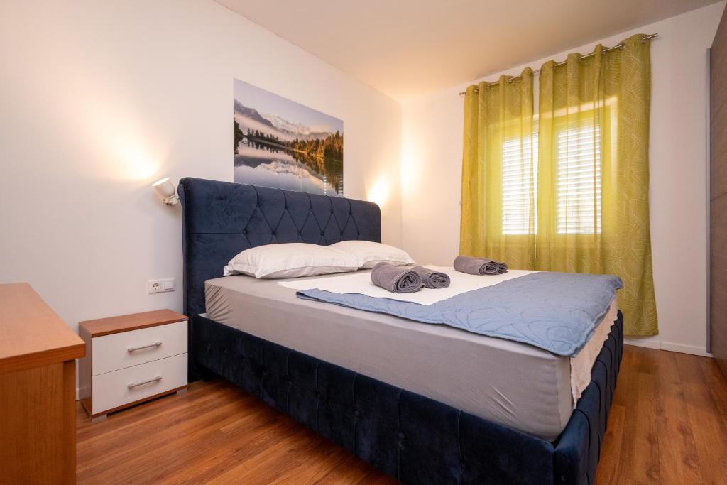 Postel nebo postele na pokoji v ubytování Apartment Dalmatino