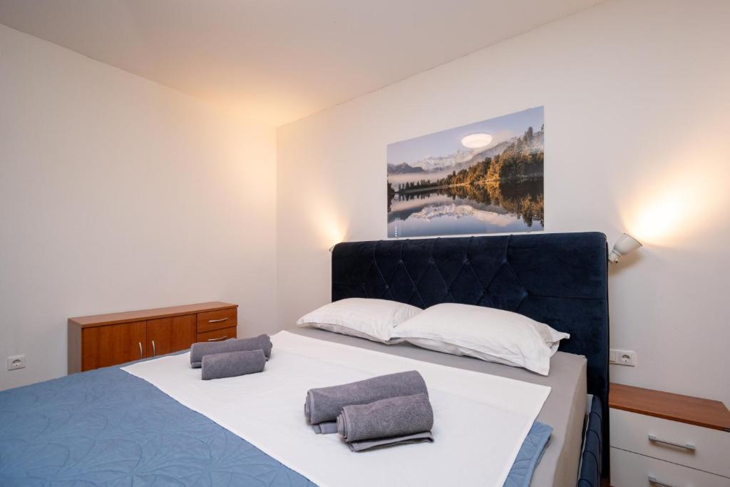 Postel nebo postele na pokoji v ubytování Apartment Dalmatino