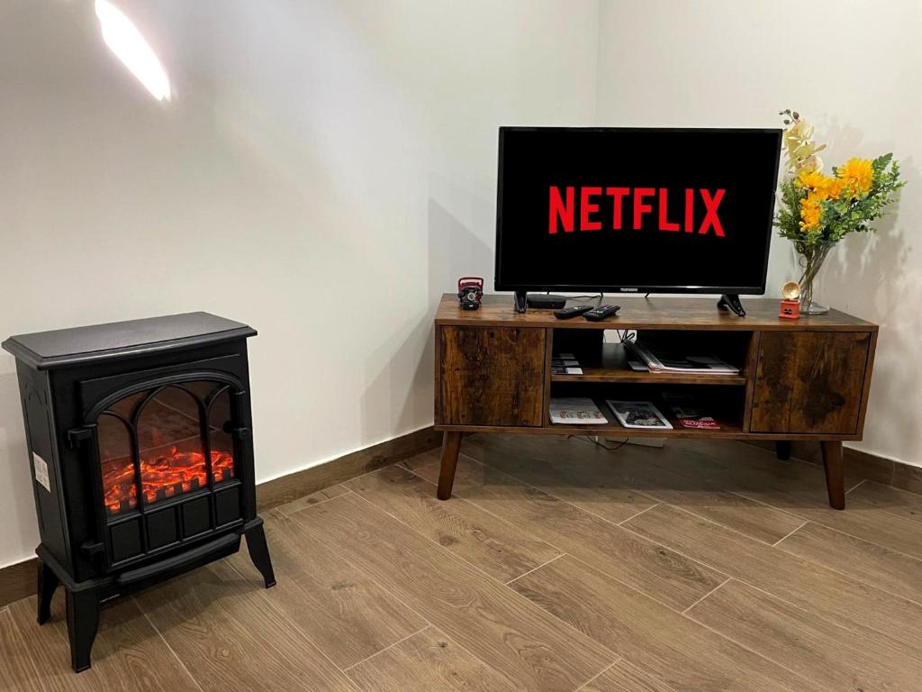 TV a/nebo společenská místnost v ubytování Cantinho D'Aldeia