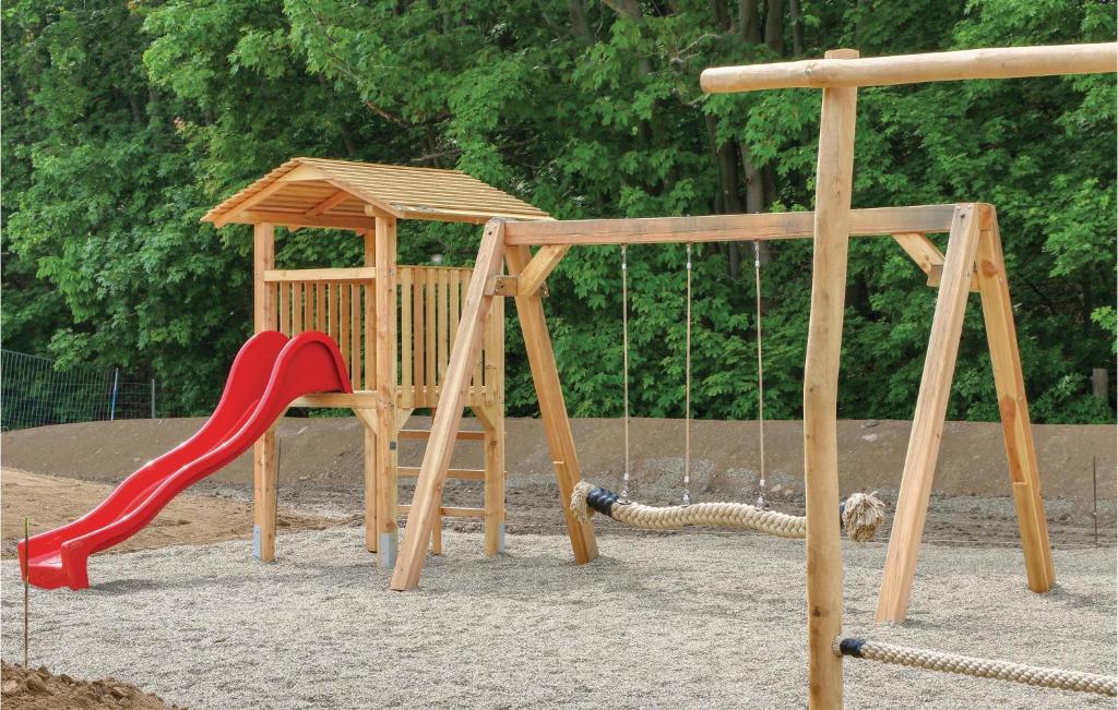 Herní místnost nebo prostor pro děti v ubytování Ferienhausdorf Thale