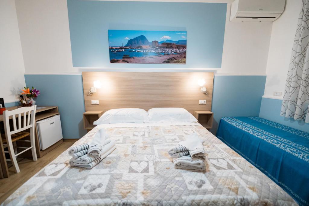 Posteľ alebo postele v izbe v ubytovaní B&B Profumi di Sicilia