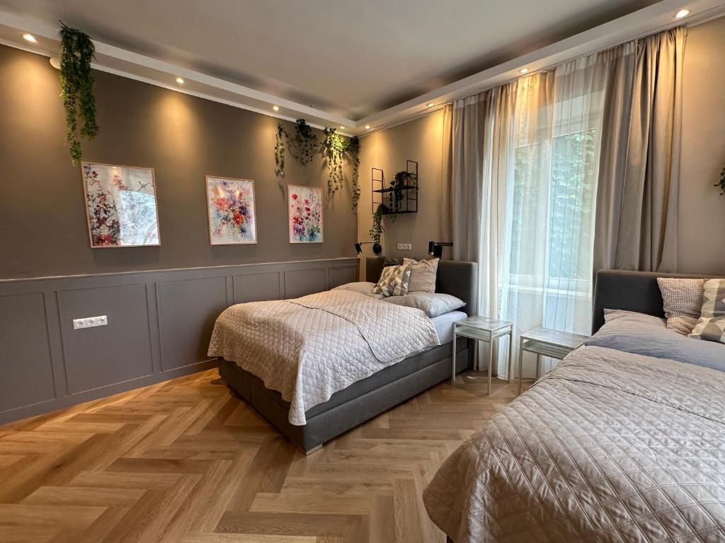 Posteľ alebo postele v izbe v ubytovaní Book-A-Room Salzburg Apartment 31