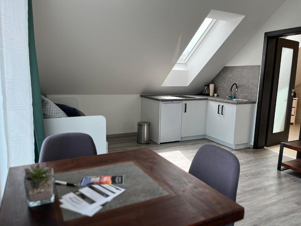 Kuchyň nebo kuchyňský kout v ubytování Apartmány u Romany